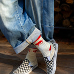 Showing off the retro white Equator performance socks outdoors with a pair of Converse | Equator Coffees